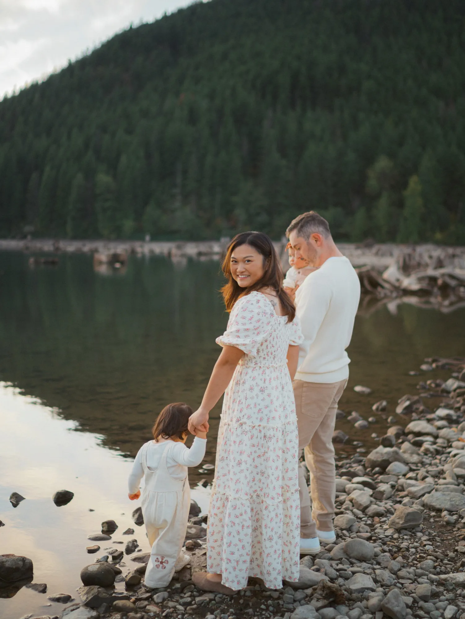 Dr. Meilin Yang by a lake with her family